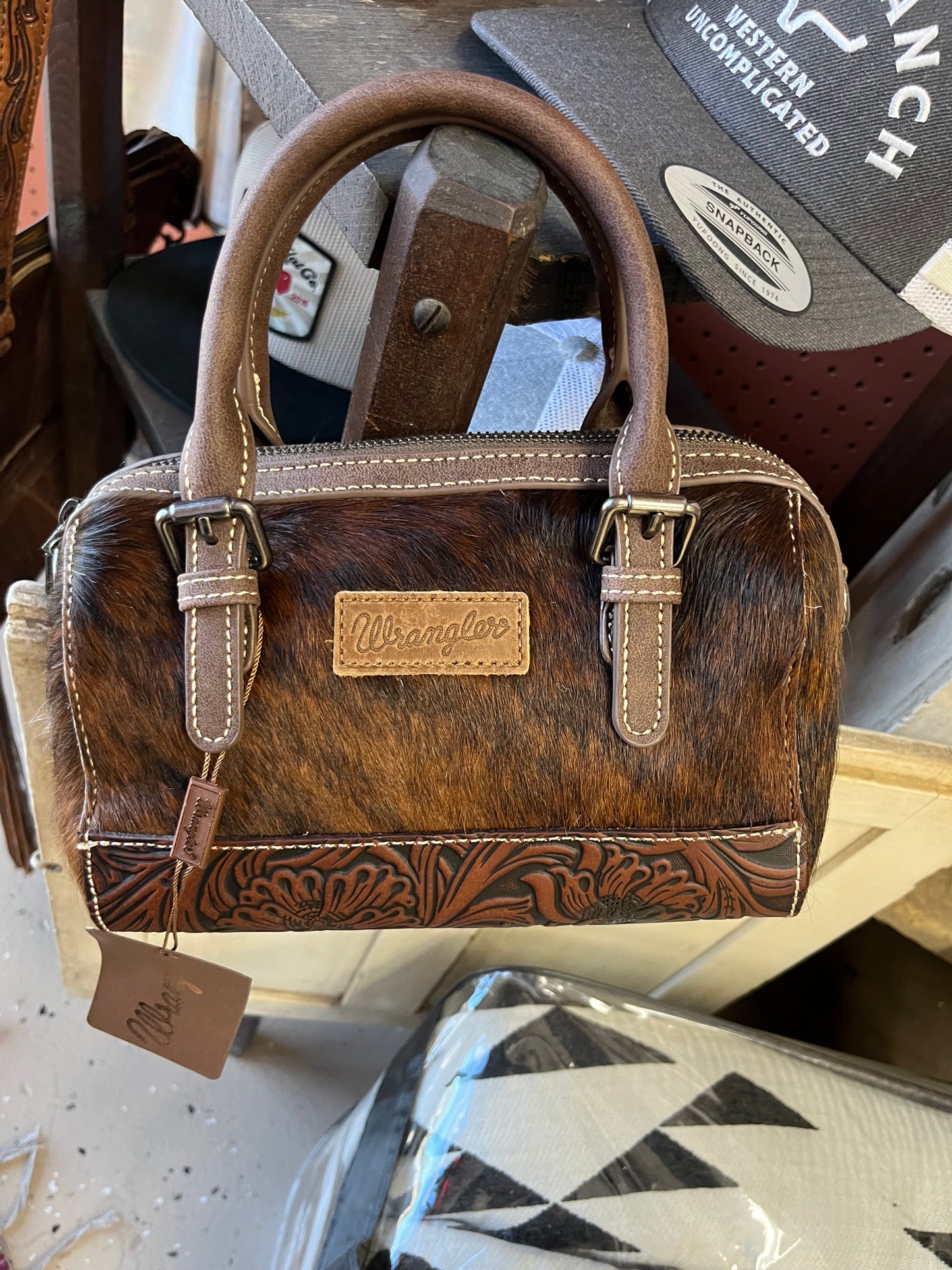 Cowhide and chocolate leather Wrangler barrel bag