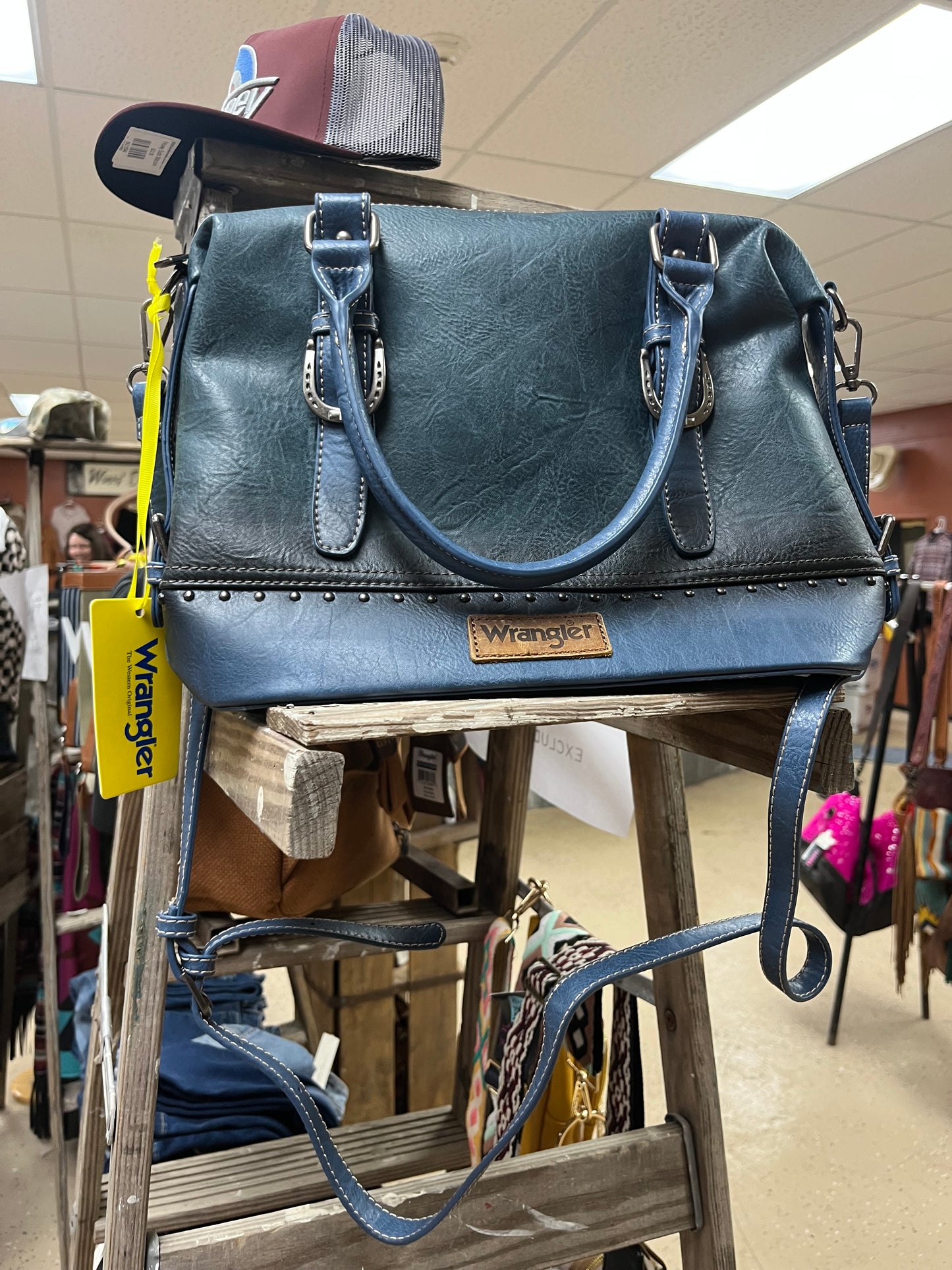 Blue leather wrangler purse with rivets