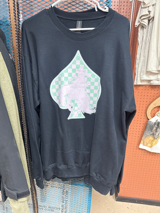 Pink and green checkered spade