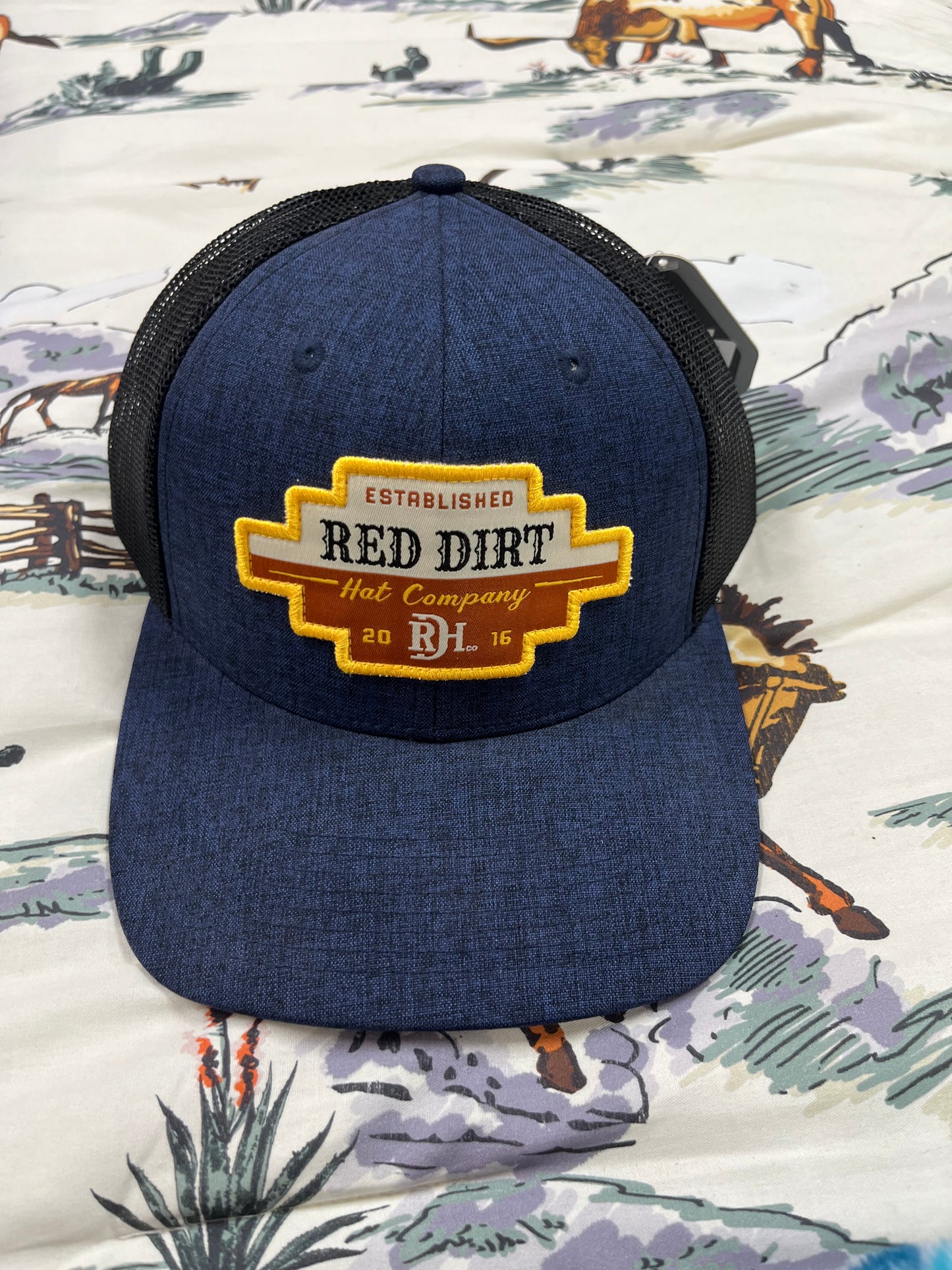 Red Dirt gold thread patch on navy cap - Wines'Designs